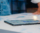 Millennial Asia businessmen and businesswomen meeting brainstorming ideas about new paperwork project colleagues working together planning success strategy enjoy teamwork in small modern night office.